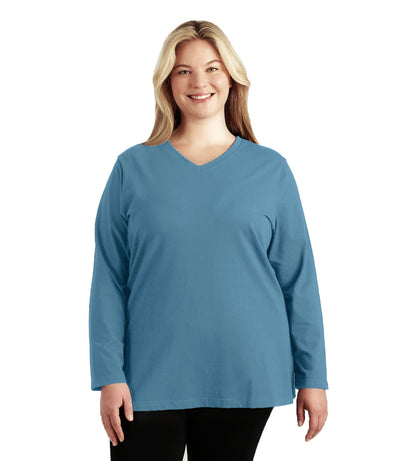 Plus size woman, facing front, wearing JunoActive plus size Stretch Naturals Long Sleeve V-Neck Top in the color Dusty Teal. She is wearing JunoActive Plus Size Leggings in the color Black.