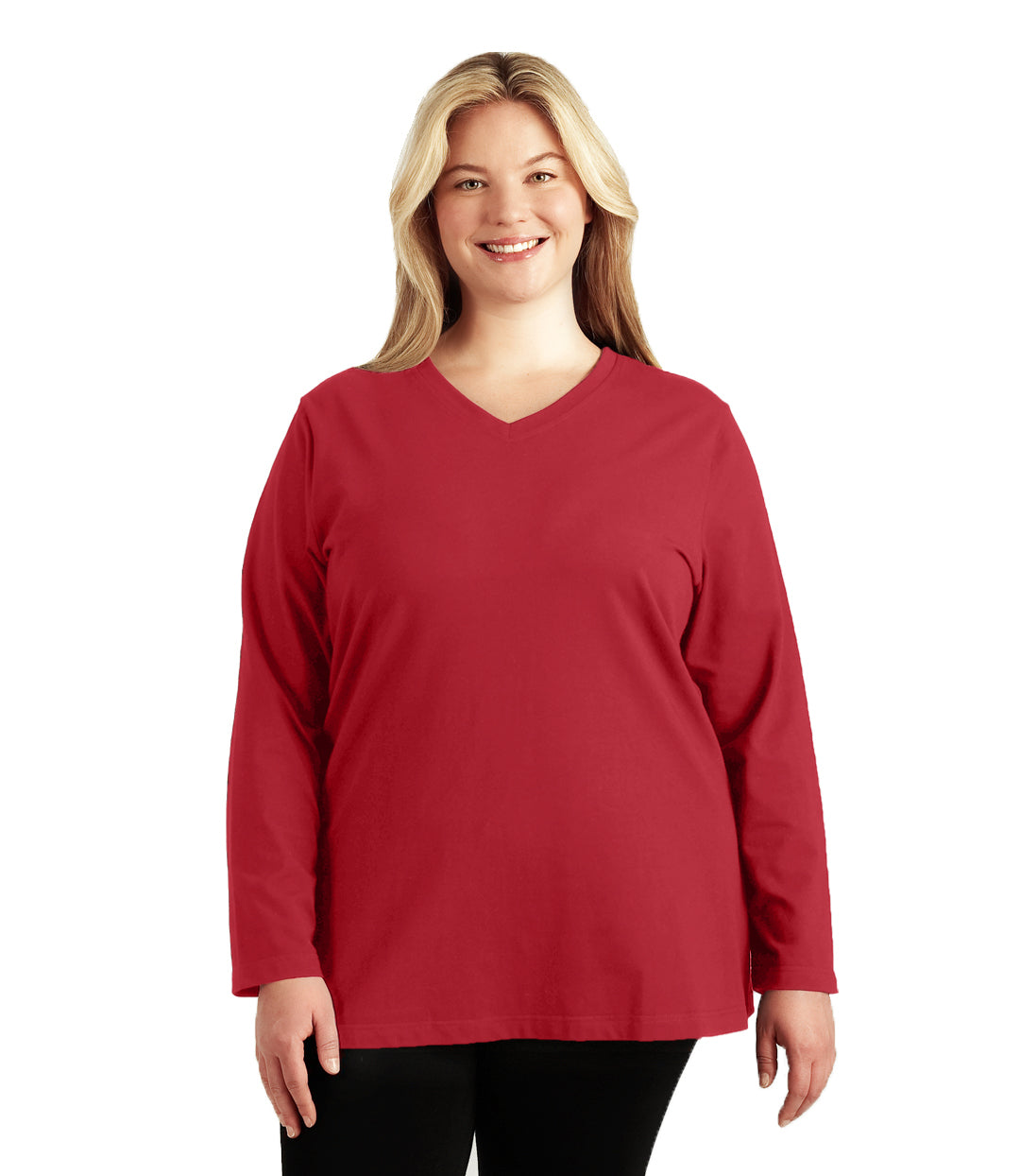 Plus size woman, facing front, wearing JunoActive plus size Stretch Naturals Long Sleeve V-Neck Top in the color Lucky Red. She is wearing JunoActive Plus Size Leggings in the color Black.