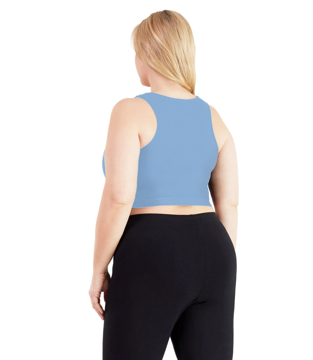 Plus size woman, facing back, wearing JunoActive plus size UltraKnit V-Neck Bras in Soft Blue. The woman is wearing a pair of Black JunoActive leggings.