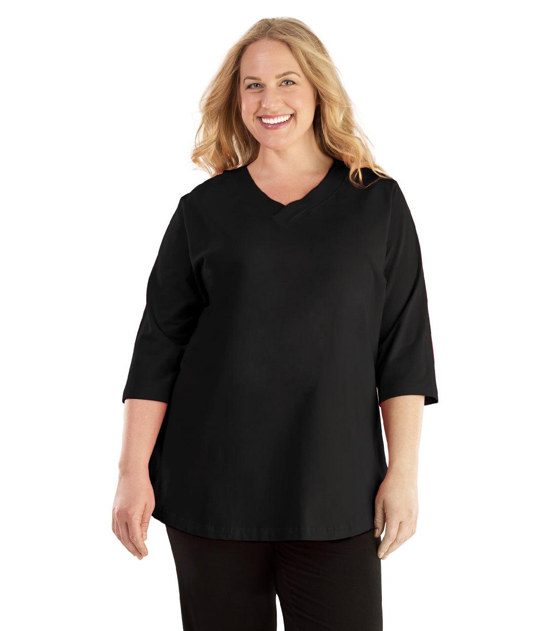 Plus size woman, facing front, wearing JunoActive plus size Stretch Naturals Vee NeckTee in the color Black. She is wearing JunoActive Plus Size Leggings in the color Black. 