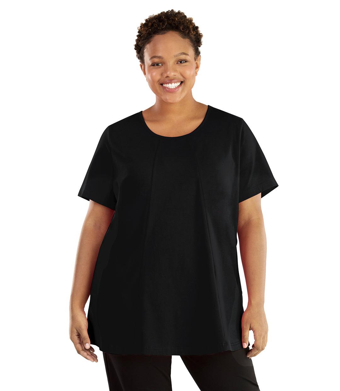 Plus size woman, facing front, wearing JunoActive plus size Stretch Naturals Lite Swing Top in the color Black. She is wearing JunoActive Plus Size Leggings in the color black.